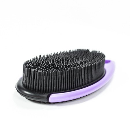 Rubber brush for removing hair and hair from upholstery.